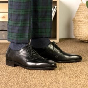 Classic Black Saddle Shoes with Red Sole
